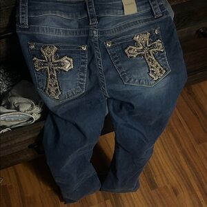 Embellished Denim Jeans with Cross Accents